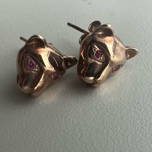 Rose gold earrings, panthers with ruby eyes.